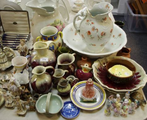 Ceramics -  five graduating German dripware jugs and two conforming fruit bowls; porcelain pin cushion dolls; early 20th cent