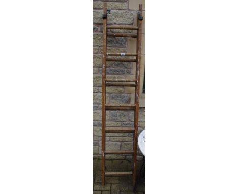A set of pitch pine stepladders/extending ladder.