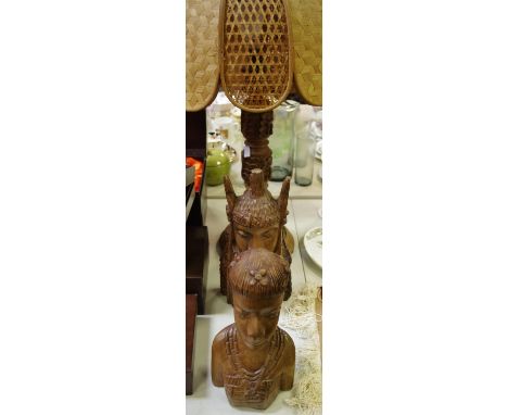 Native art - an African carved wood bust of a lady; another; an Indian carved wood table lamp. (3)