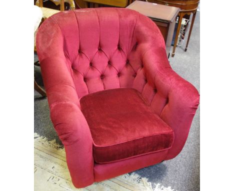 A Laura Ashley button back tub chair, in burgundy velour. 