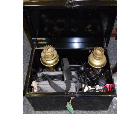 early 20th century metal trunk, with key; a pair of brass oil lamp bases; a Yashica, Praktica, Canon and Olympus camera; repr