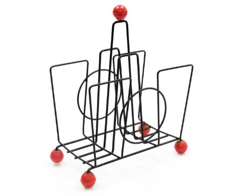 A 1950/60s 'Sputnik' wirework magazine rack, with red ball finial, on four red ball feet, 33cm high.