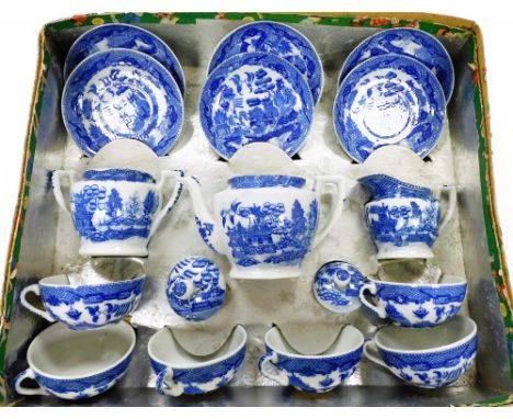 A 20thC child's boxed tea service, to include teapot marked Foreign Porcelain, 9cm high, in Willow pattern with cups, two han