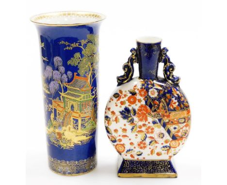 A Carlton ware cylindrical vase, on a blue ground decorated with Oriental house, trees, etc., 26cm high, and a late 19thC Ima