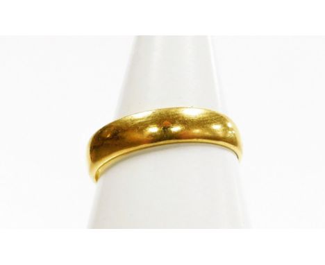 A 22ct gold wedding band, London 1911, ring size L½, 3.1g. 