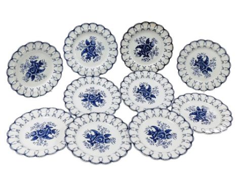 A set of ten Booths blue and white plates, in Worcester style, each with floral fret border and central fruits and flowers de