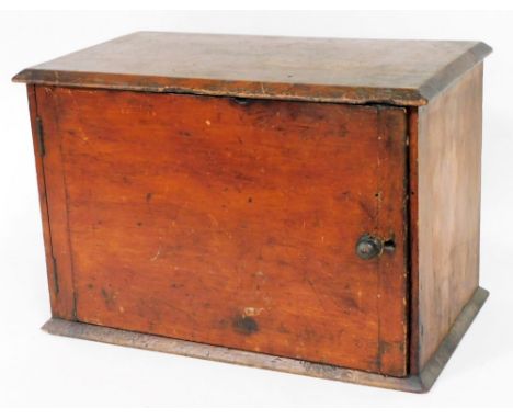 A 19thC mahogany cupboard, of rectangular form with front door and shelf to the interior, on a plain base, 31cm high, 45cm wi