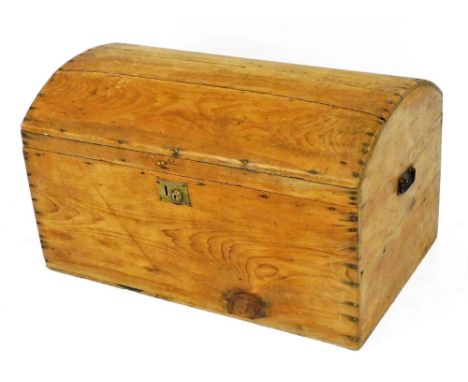 A 20thC dome topped pine trunk, with metal carrying handles and plain interior, 34cm high, 81cm wide, 50cm deep. 