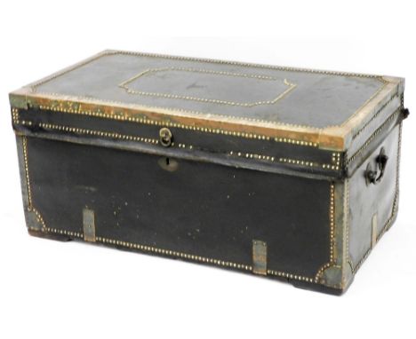 A 19thC crest leather studded and metal bound trunk, of rectangular form, with side carrying handles and plain interior, 43cm