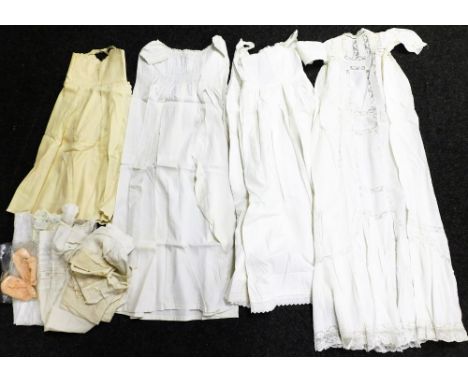 Various christening and day gowns, to include three christening robes made by Elsie Weldon for her children, the first born 1