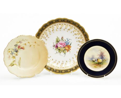 A collection of Royal Worcester porcelain cabinet plates, to include a plate decorated with sheep within a blue and gilt high