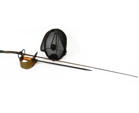 A vintage fencing mask and two associated fencing swords, one with turned handle, the other with a plain handle and heavy gua