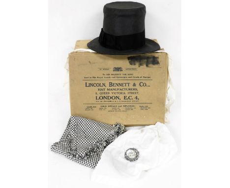 An early 20thC Welsh hat by A. Spurling, with interior with a hand sewn label for Ludbury, a small white cotton apron, with h