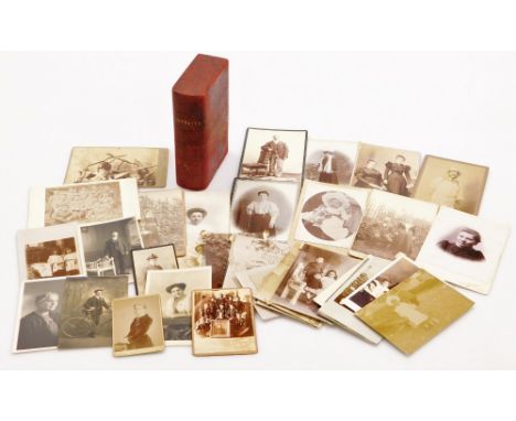 A portraits book slip case, containing various photographs, early 20thC black and white portrait photographs, child aside cha