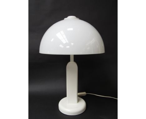 A white Guzzini type table lamp