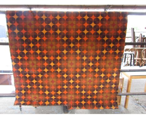 A late 1960's carpet panel in Panton style with coloured circles on orange ground.  180cm wide x 325cm approximately 