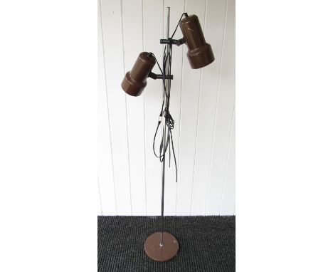 A chrome standard lamp with twin brown metal spots