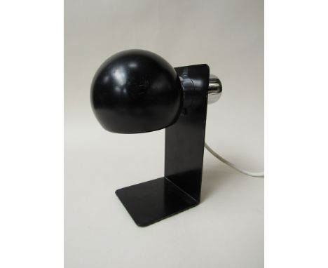 A spherical black painted and chromed metal table lamp