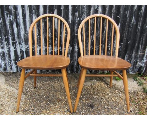 A pair of 1960's Ercol dining chairs 
