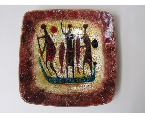 A 1950's Italian enamel dish with stylised figures, indistinct manufacturers mark and Italy to reverse, 20cm wide 