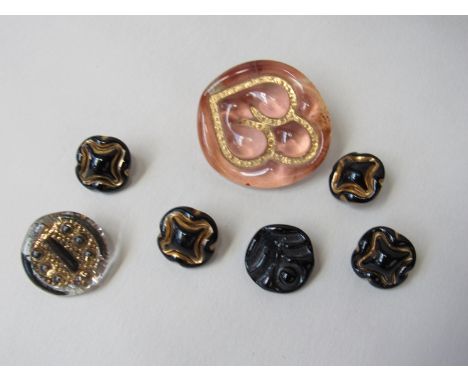 A 1940's glass brooch and a collection of glass buttons in the style of Dame Lucie Rie for Bimini   (7)