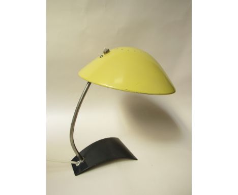 A yellow metal Kaiser 6840 desk lamp, label to underside