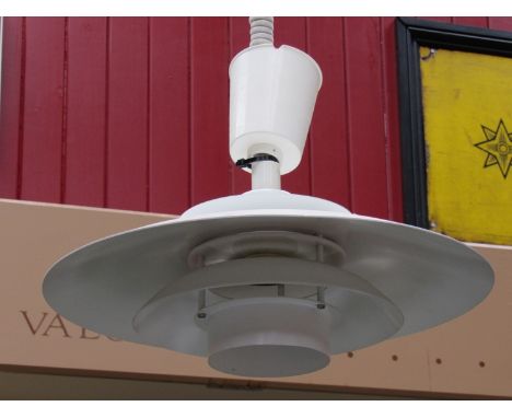 A Danish Poulson style four tiered ceiling light in white 