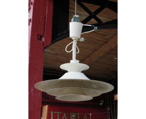 A Danish Poulsen style ceiling light in white of four tiers 