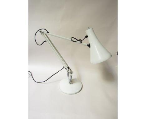 A white anglepoise desk lamp 