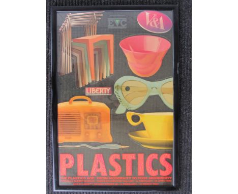 A framed glass advertising panel featuring Liberty, V & A etc 