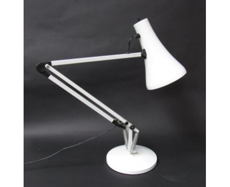A white angle poise desk lamp