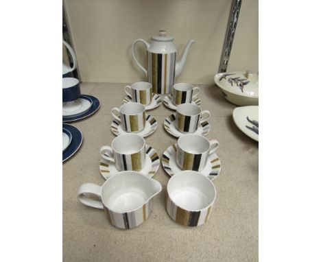 A Midwinter Queensbury pattern coffee set comprising six cups and saucers, milk and sugar 