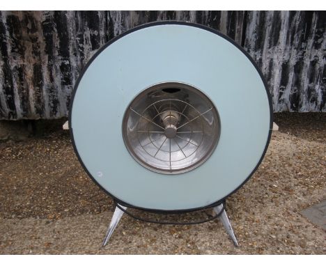 A 1950's  "Challenge" floor standing circular heater, pale blue surround 