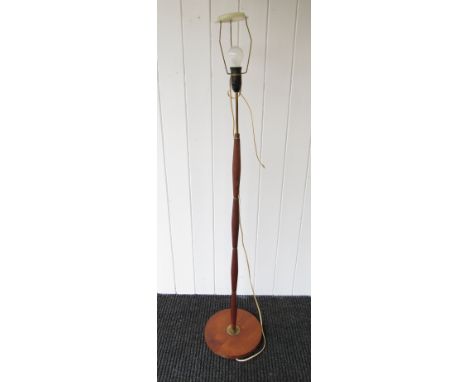 A Danish teak and brass ring column standard lamp 