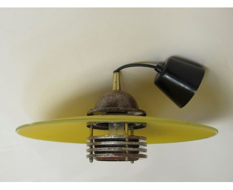 A Danish style yellow glass and metal tiered ceiling light 