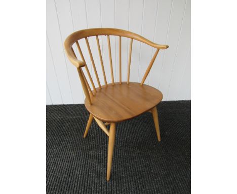 A 1960's Ercol cowhorn armchair 