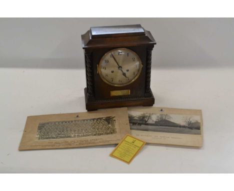 Edwardian oak cased mantel clock with two barley twist columns, brass plaque inscribed "Presented  to Corporal R H Minns by m
