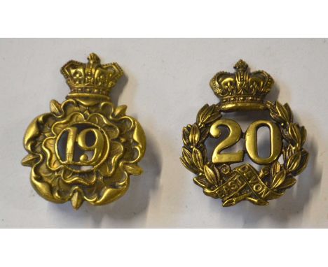 Two Victorian brass Glengarry cap badges to include 20th Regiment of Foot (East Devonshire) and 19th Regiment of Foot (First 
