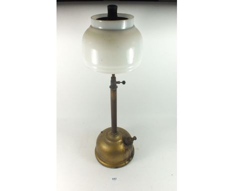 A vintage Tilley table lamp with glass shade 