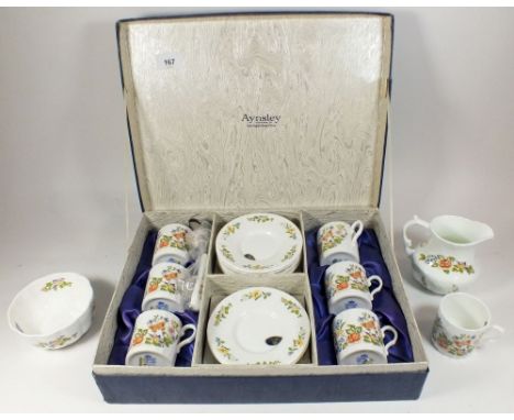 An Aynsley coffee set comprising: six cups and saucers boxed plus separate boxed jug and sugar and unboxed spare cup and sauc