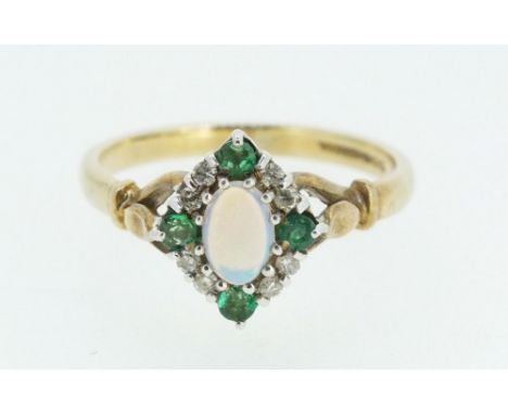 A 9ct gold ring set with central opal flanked by white and green stones, 3g, size O 1/2 