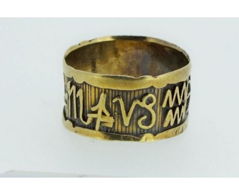 A 15 carat gold antique zodiac ring (unmarked, tested as 15 carat) size K/L, 3.5g 