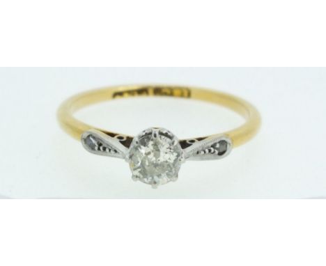 A 1920's 18 carat gold and platinum solitaire diamond ring, estimated diamond weight 0.35ct, size K, 1.9g