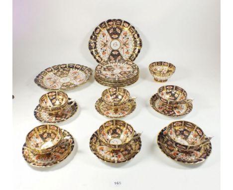 A Royal Crown Derby Imari part tea set in pattern 9264, comprising six cups, six saucers, six side plates, sugar bowl and two