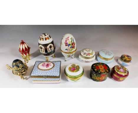 A selection of porcelain trinket boxes and two enamel eggs