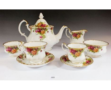 A Royal Albert Country Roses teaset comprising six tea cups and saucers, six coffee cups and saucers, one cake plate, rectang