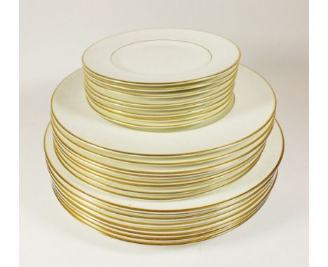 An eight place setting Royal Worcester 'Concerto' dinner service comprising:- eight dinner plates, eight side plates and eigh