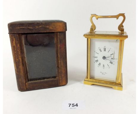A brass carriage clock by Bernard Freres of Bicester engraved presentation, cased 