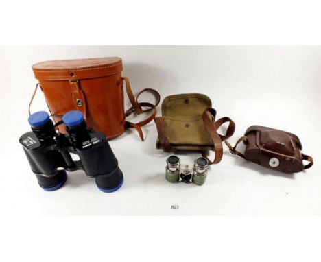 A pair of opera glasses, an old Baldixette  camera and a pair of Zenith 7 x 50 binoculars, cased 