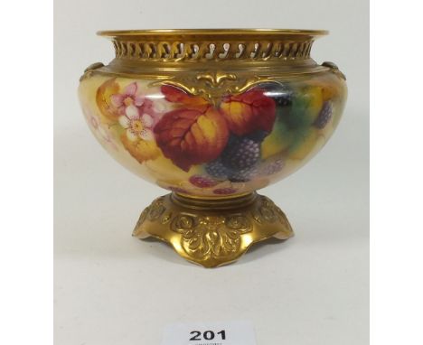 A Royal Worcester porcelain pot pourri vase with gilt scrollwork embossed base and reticulated rim, handpainted decoration of